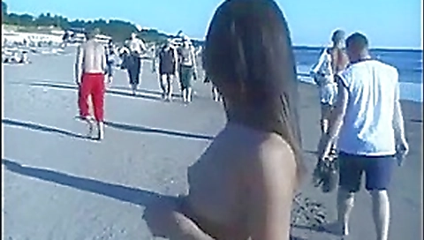 Awesome naked sexy girl walking on the beach