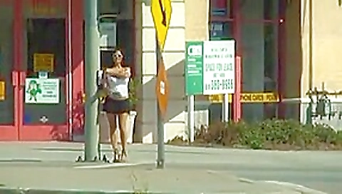 Gorgeous brunette shows off in city and on a terrace