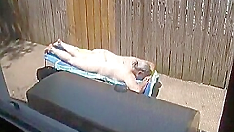 Kim Bates caught laying out in the nude. Enjoy the view.