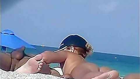 Chick caught on hidden webcam with no clothing on in a nudist beach camp
