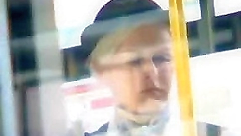 Big titty stewardess gives a public handjob to a horny Asian dude