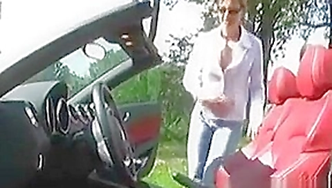 Squirting On A Cars Gear Shift Outdoors