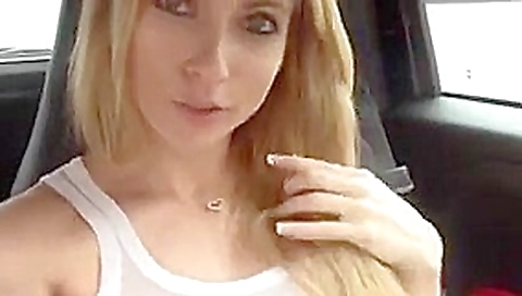 Delicious blonde girl masturbating in the car