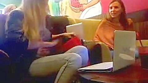 Two girls flash and play in cafe.flv
