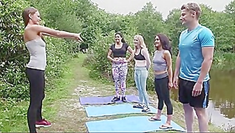 Girls and a boy do yoga outdoor Girls and a boy do yoga outdoor