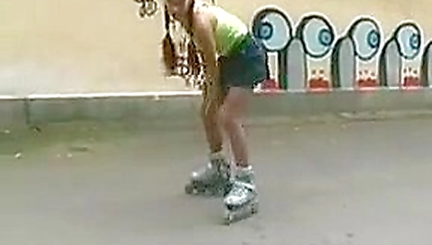 Sexy roller girl flashing