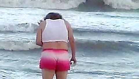 Slut with strangers on the beach Slut with strangers on the beach