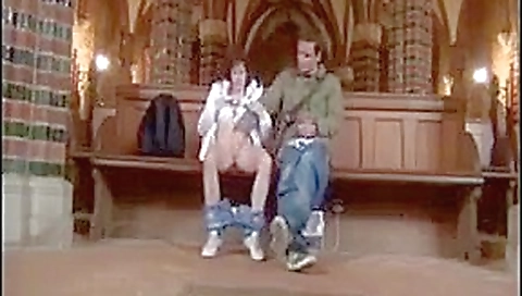 Couple sex play in a church