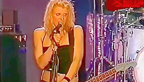 Hole's Courtney Love in topless on stage at the Big Day Out 1999 Hole's Courtney Love in topless on stage at the Big Day Out 1999