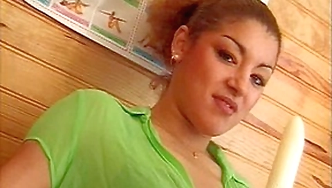 Euro slut fucking a dildo in a gym