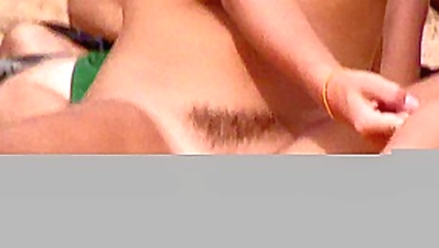 Handjob sex with a naked bitch on a public beach