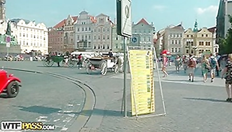 Hawt beauty shows melons in the midst of a lively square Hawt beauty shows melons in the midst of a lively square