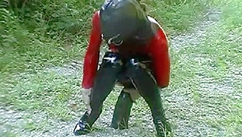 Butt toying in latex during a hike in the nature Butt toying in latex during a hike in the nature