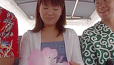 Innocent looking Japanese babe getting some in the backseat