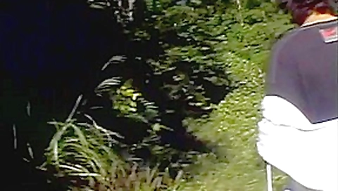 Nice Japanese nymphet has hands tied outdoor