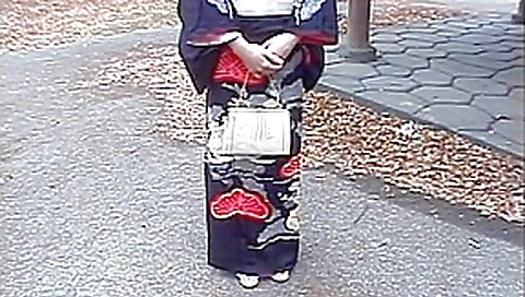 Gorgeous Asian brunette babe in her sexy and stunning kimono gagging a hard cock and fucked