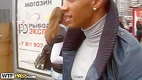 Blonde sexy angel in nature's garb in park